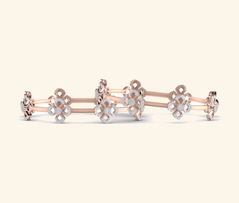 Two-tone geometric diamond bar bangle with architectural spacing.
