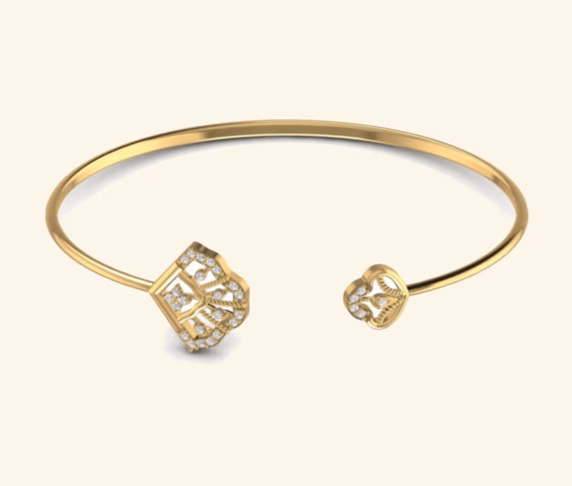 Light open cuff with diamond-set rounded end caps.