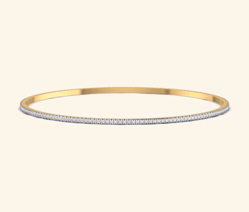 Ultra-slim gold bangle with a clean continuous diamond line.
