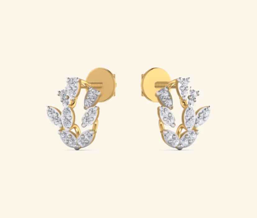 Marquise diamond stud earrings with refined gold band.