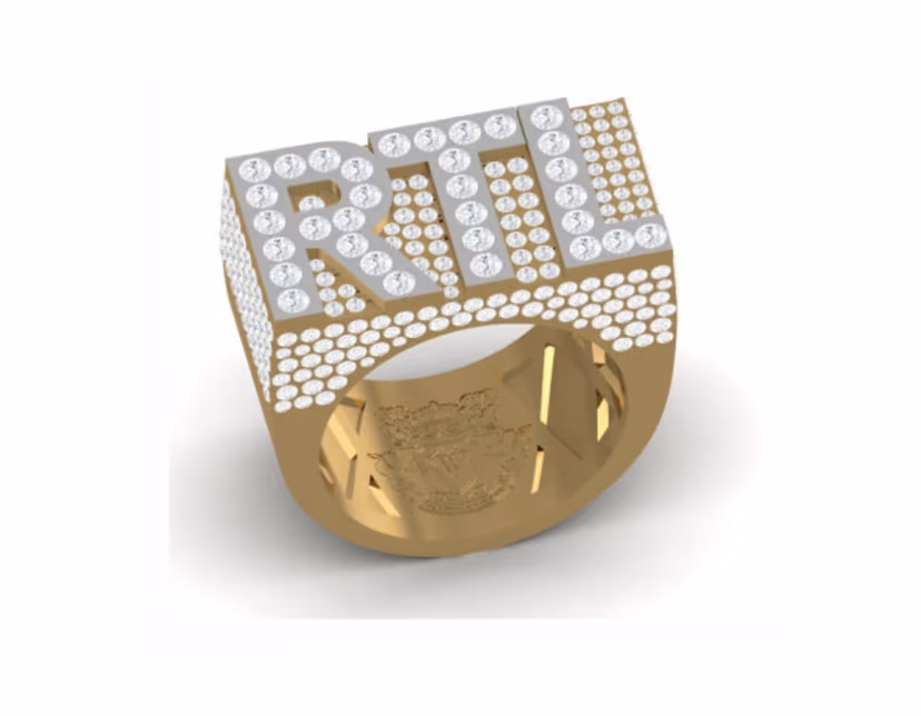 Iced block-letter RTL signature standing tall above a polished crested shank.