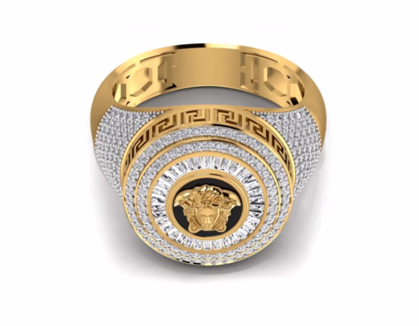 Round Medusa-emblem signet framed by a Greek-key pavé halo.