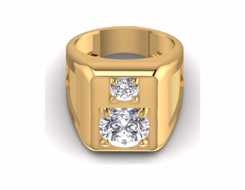Two-stone bezel ring pairing a large round and a smaller accent stone in heavy gold.