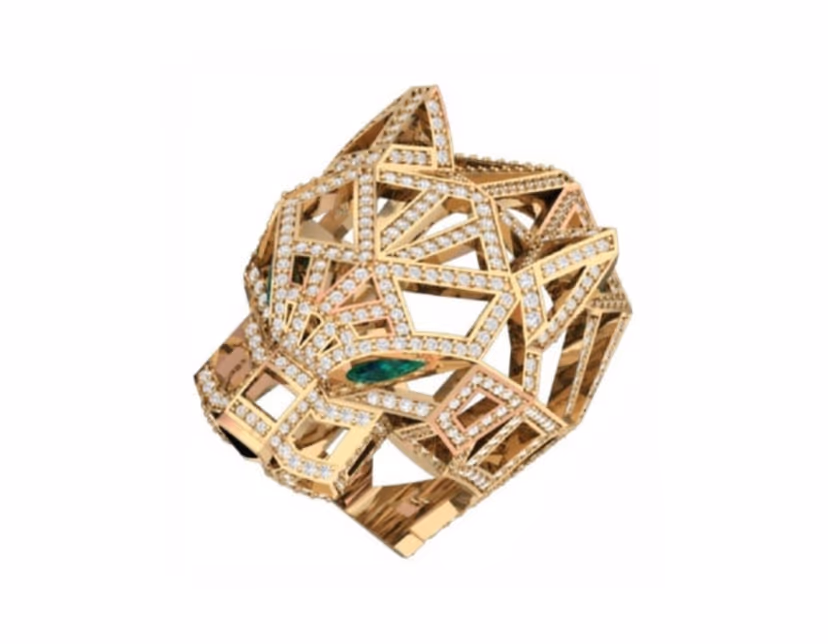 Skeletonized panther head ring with a pavé lattice cage and emerald eye accents.