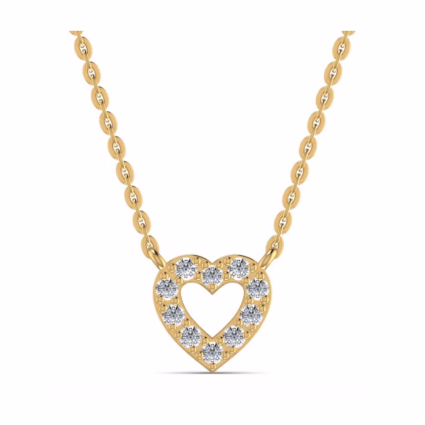Pavé starburst micro-pendant on a polished gold chain.