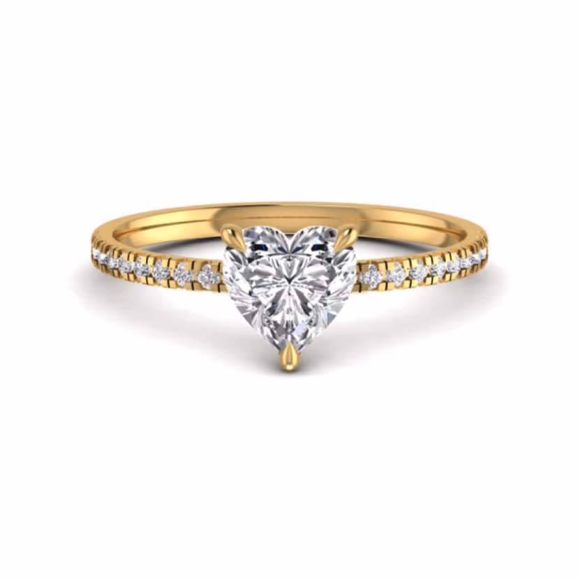 Tapered pavé half-band ring with polished gold edges.