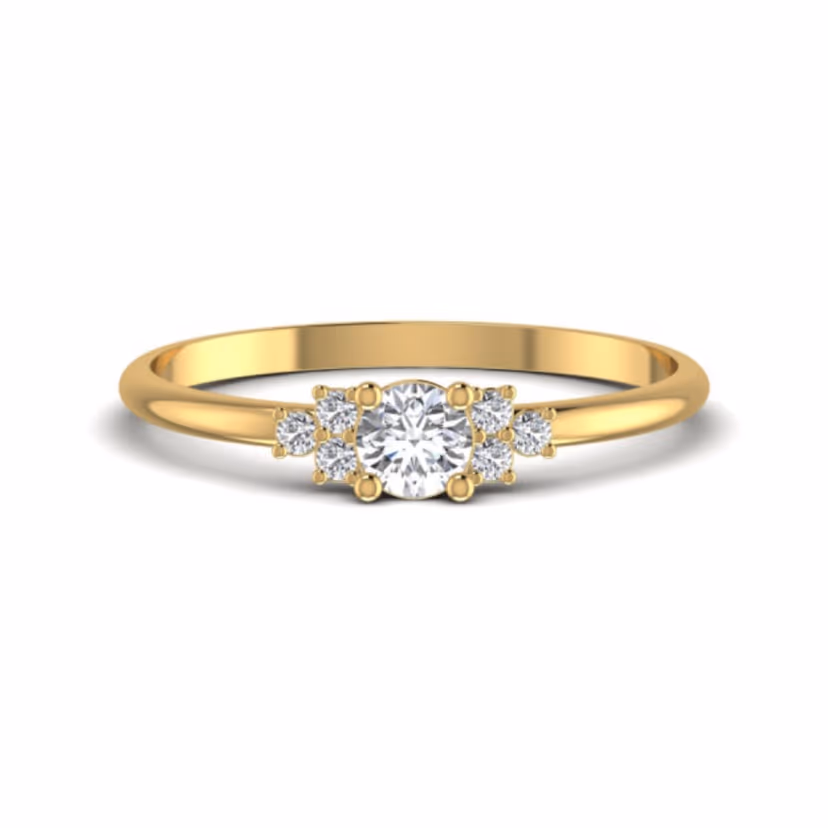 Slim pavé station ring with sparse diamond accents.