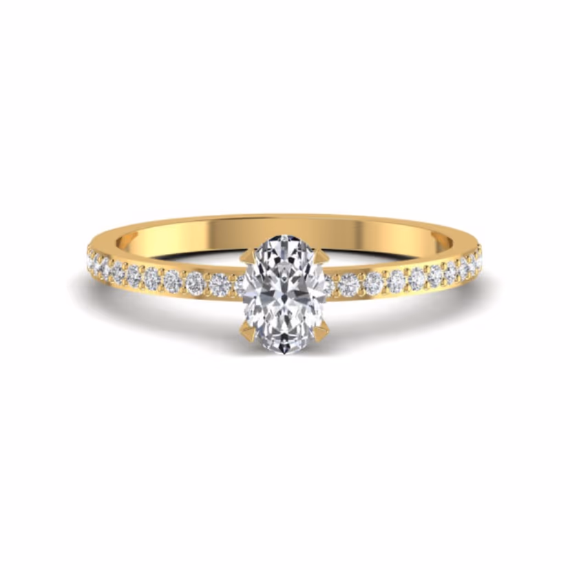 Three-stone cushion-cluster ring with prong-set rounds.