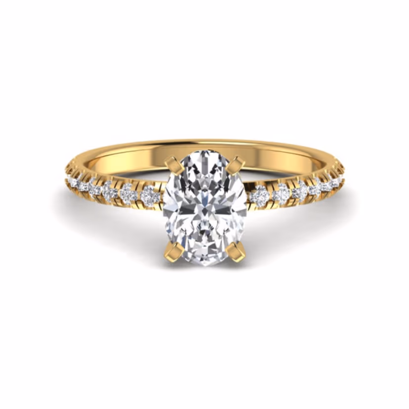 Round halo ring with continuous pavé shoulders.