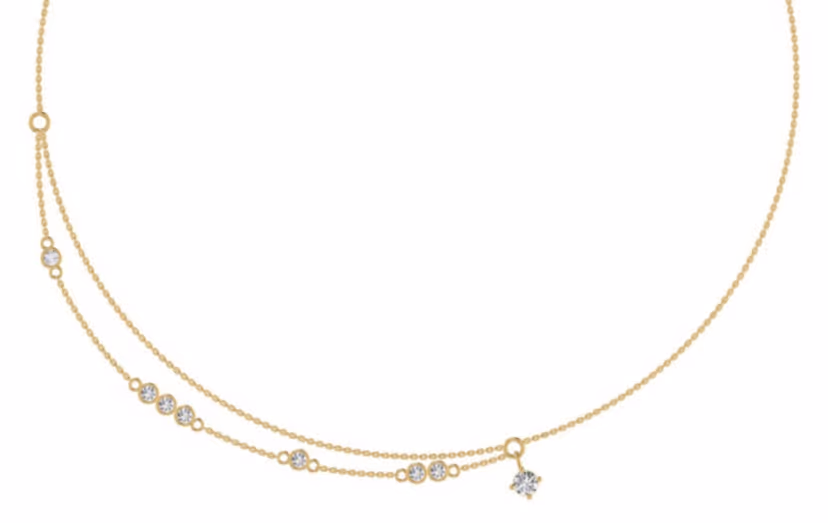 Single-pendant solitaire necklace with bezel centre.