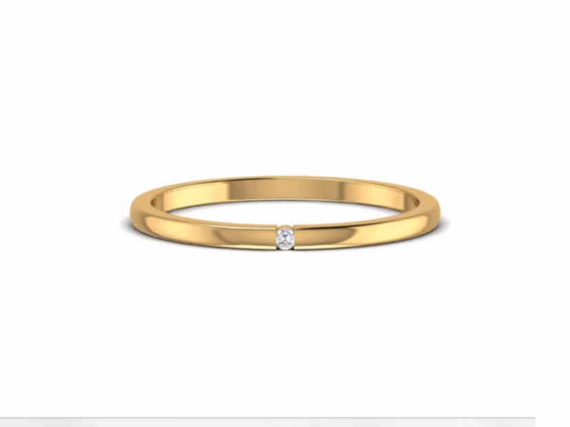 Everyday-weight 1.50g band set with a 0.14ct round diamond