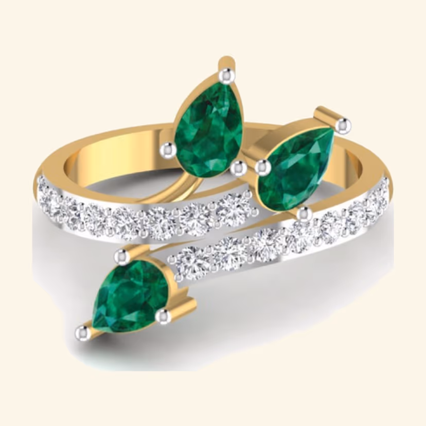 Round emerald solitaire ring with starburst pavé halo and tapered diamond shoulders.