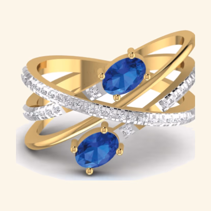 Twin pear sapphire ring with crossing diamond ribbon shanks.