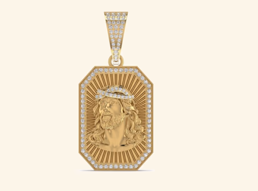 Octagonal Christ portrait pendant with rayed gold backdrop and pavé border.