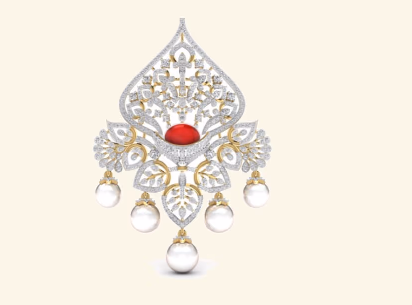 Bridal spade pendant with ruby cabochon centre, pearl drops and dense diamond filigree.