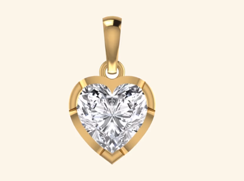 Heart-cut diamond solitaire bezel-set pendant with slim gold bail.