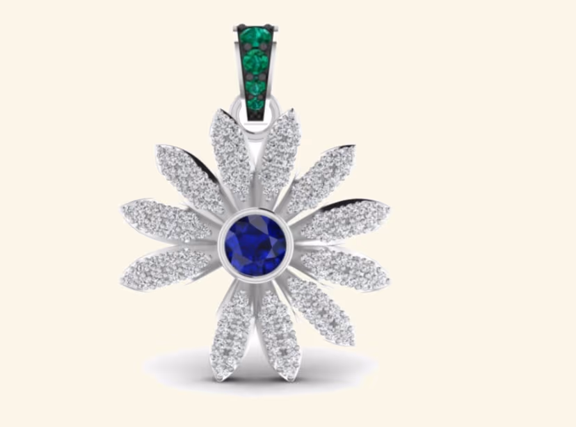 Daisy-flower pendant with central blue sapphire and emerald-set bail.