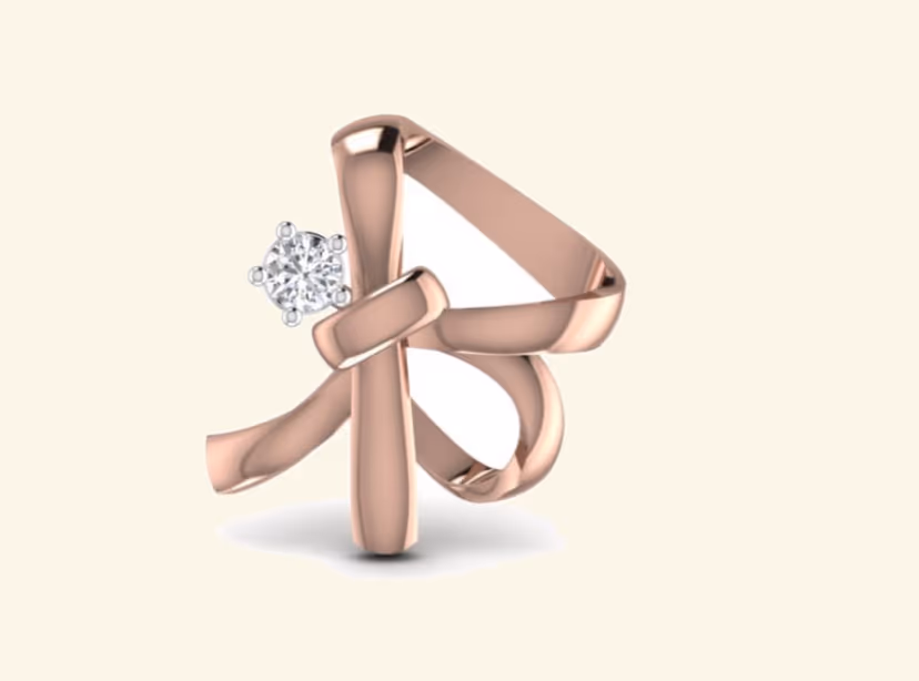 Rose-gold ribbon-knot pendant with offset round prong-set diamond.