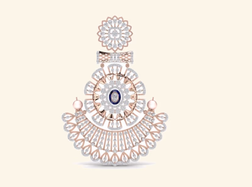 Bridal chand-bali fan pendant with rose-gold scrollwork, blue stone and pearl drops.