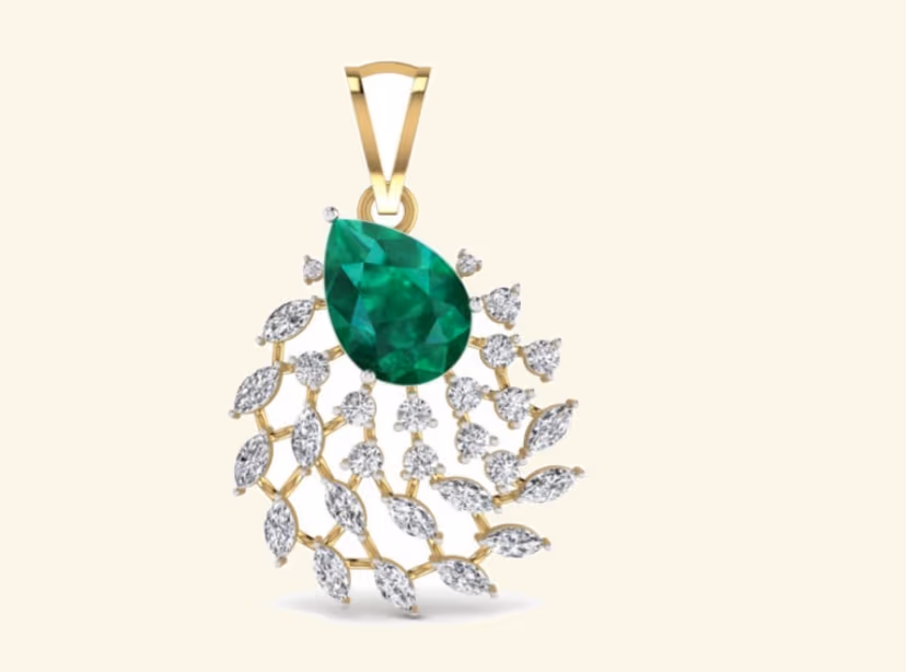 Pear emerald pendant with diamond marquise wave spray below.