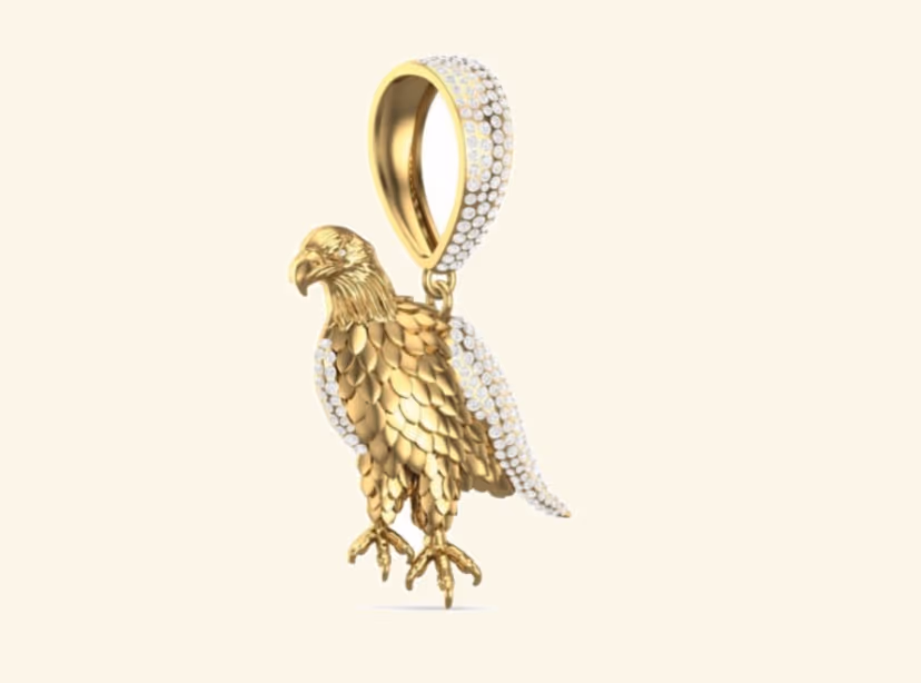 3D eagle pendant with pavé wing detail and sculpted gold body.