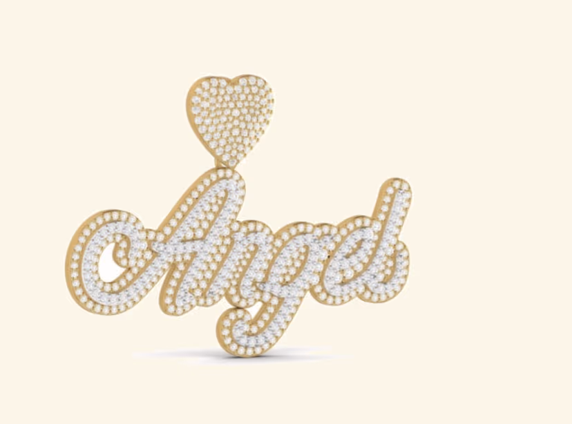 Angel cursive script pavé pendant with pavé heart topper.