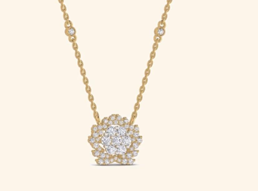 Stylized rose-flower pendant on bezel-station chain with pavé halo.