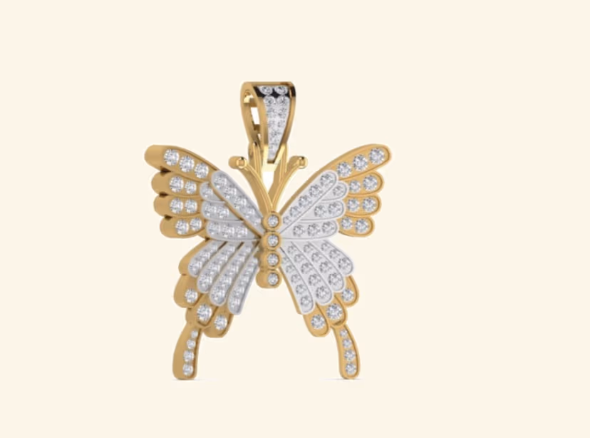 Two-tone butterfly pendant with layered pavé wings and gold bail.
