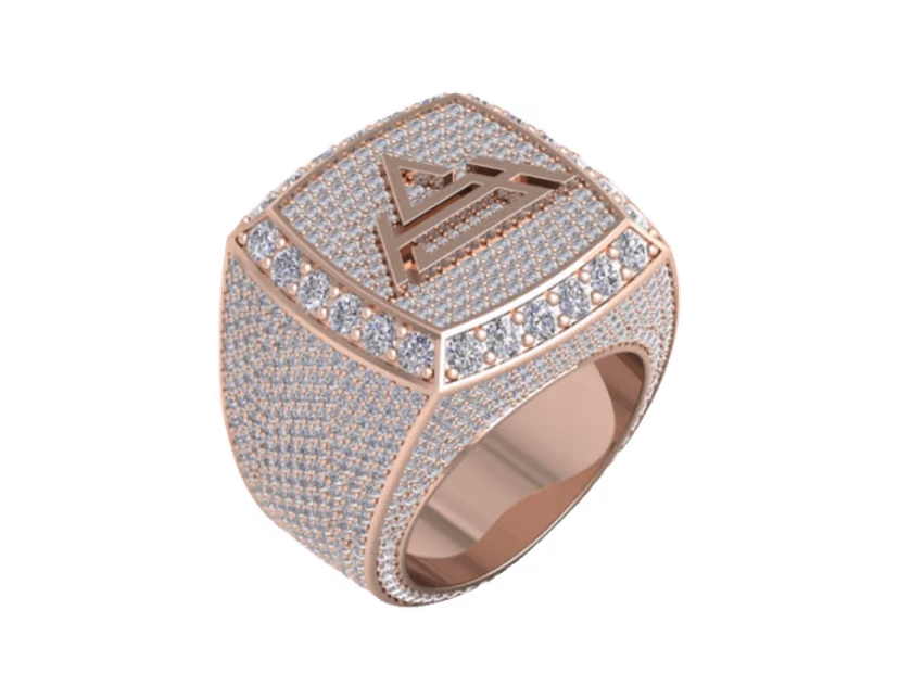 Iced rose-gold championship signet with a raised triangle peak motif.