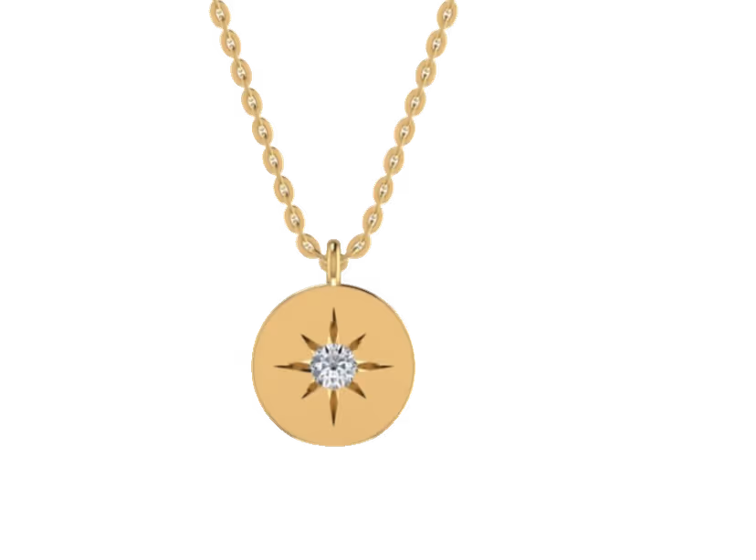 Round gold disc pendant with single star-cut diamond inset.