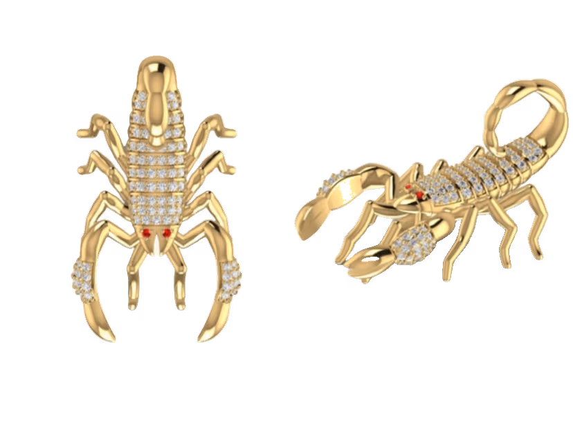 Pavé scorpion pendant pair with pavé back and ruby eye accents.